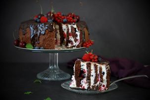 Chocolate Swiss Roll Cake With Creamy Filling And Fruit Chocolate Swiss Roll Cake With Creamy Filling And Fruit